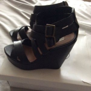 Steve Madden “Connected” Black Leather Wedge